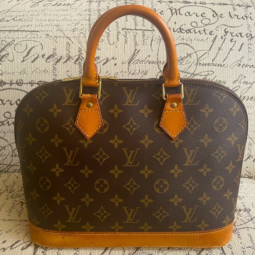 Authentic Louis Vuitton Alma hand bag